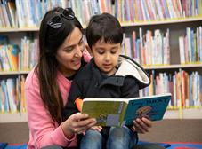 woman and child reading